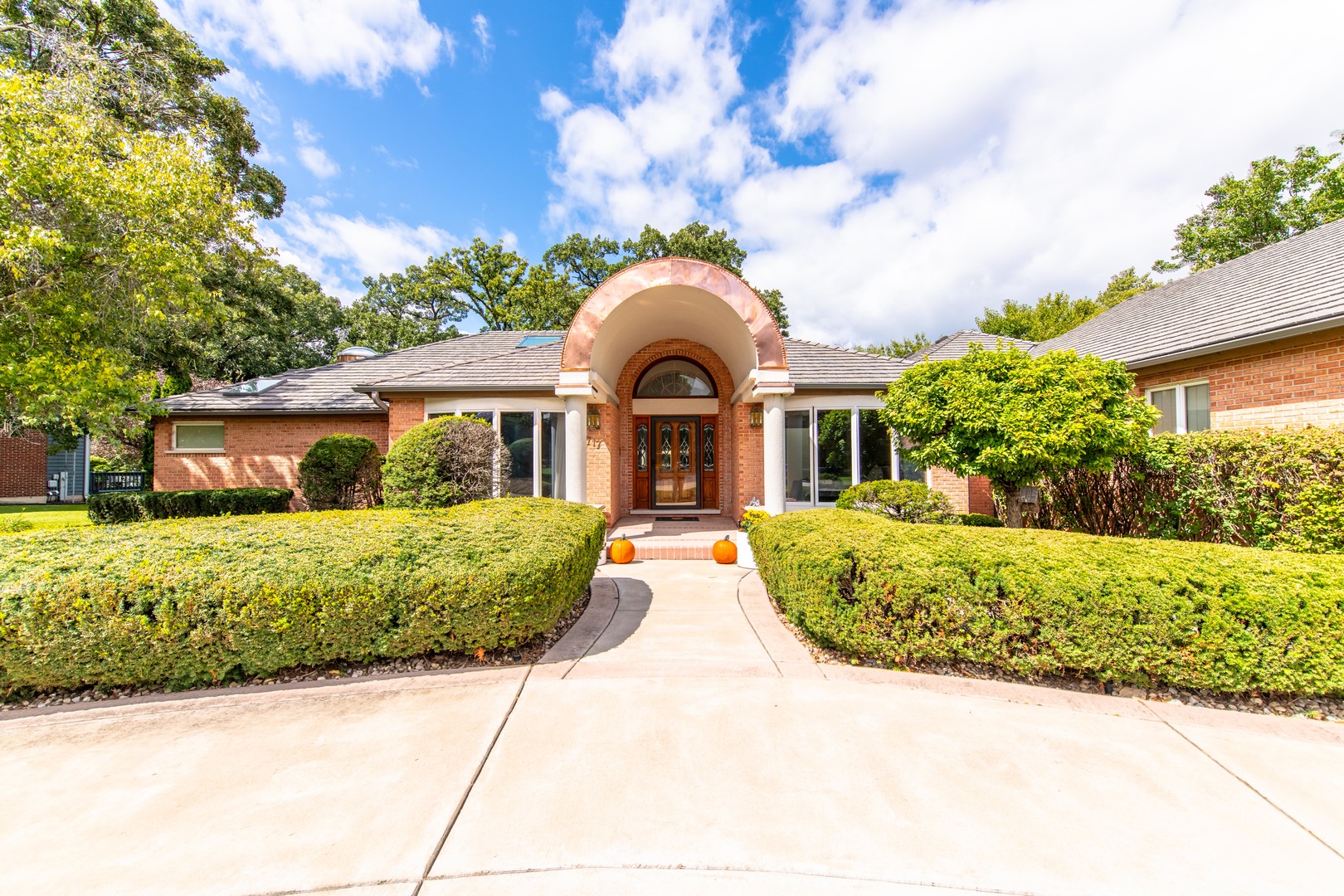 717 Westridge Road Joliet, IL 60431 - Photo 3 of 68 a front view of a house with a garden