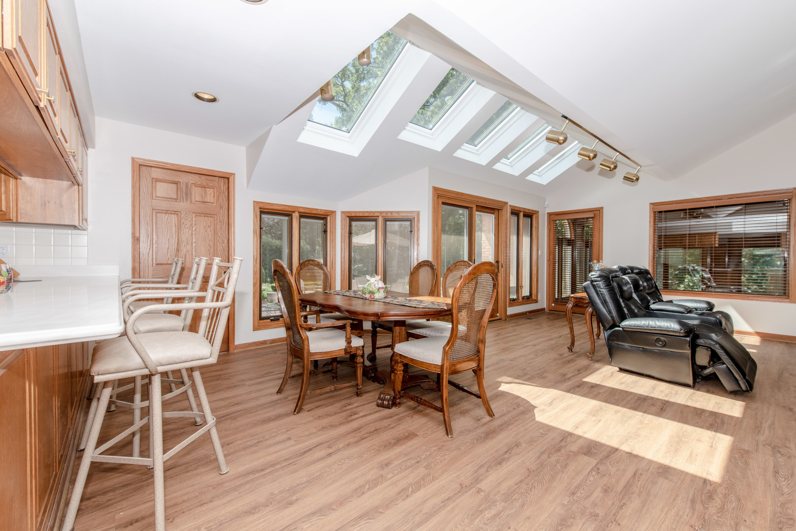 717 Westridge Road Joliet, IL 60431 - Photo 54 of 68 a view of a dining room with furniture window and wooden floor