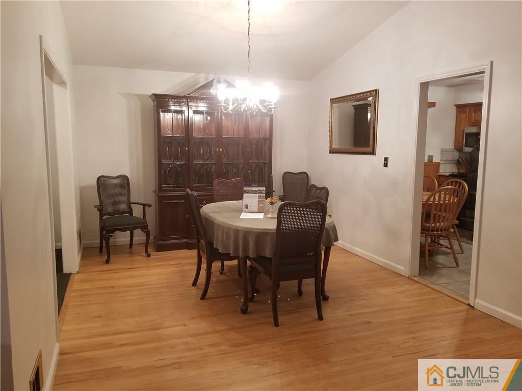 47 Harmon Road Edison, NJ 08837 - Photo 2 of 24 a view of a dining room with furniture