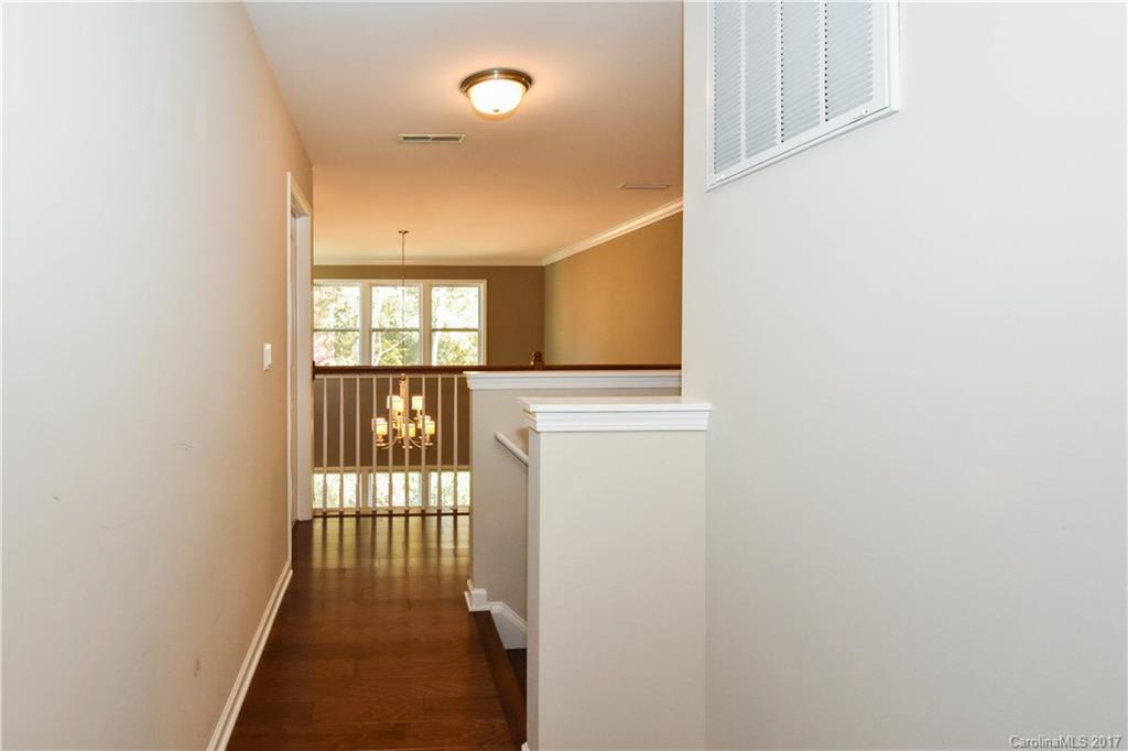 7079 Meyer Road Fort Mill, SC 29715 - Photo 14 of 20 a view of a hallway with a window