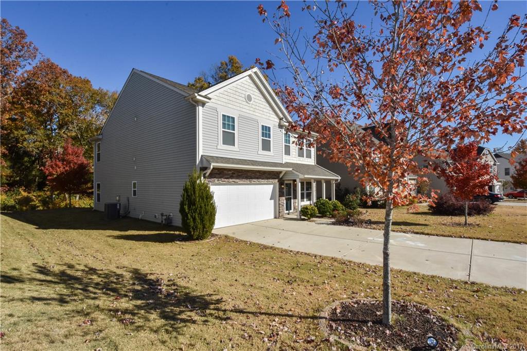 7079 Meyer Road Fort Mill, SC 29715 - Photo 19 of 20 a front view of a house with a yard