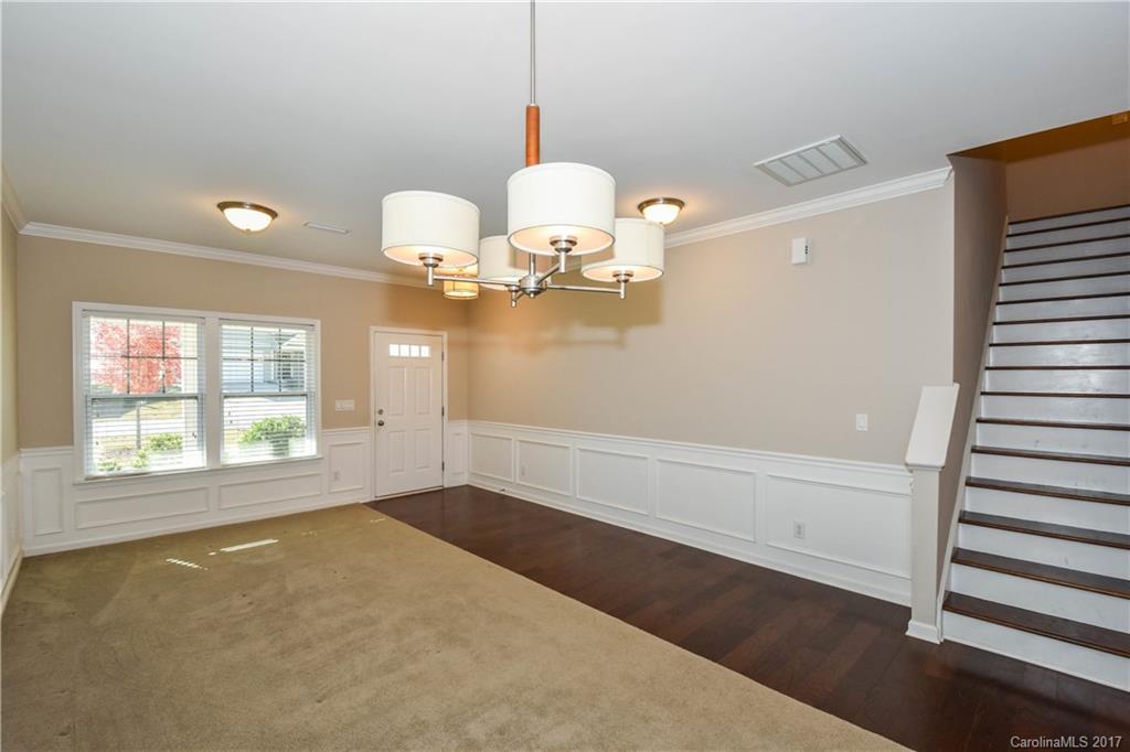 7079 Meyer Road Fort Mill, SC 29715 - Photo 4 of 20 wooden floor in an empty room with a window