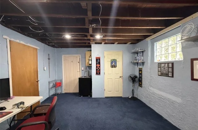 a view of a house with backyard and porch