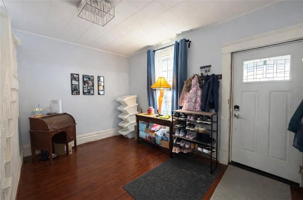 329 New Castle Street Slippery Rock, PA 16057 - Photo 2 of 27 a view of game room with window and couch