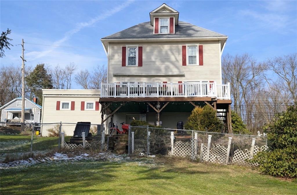 329 New Castle Street Slippery Rock, PA 16057 - Photo 24 of 27 a front view of a house with a garden and swimming pool