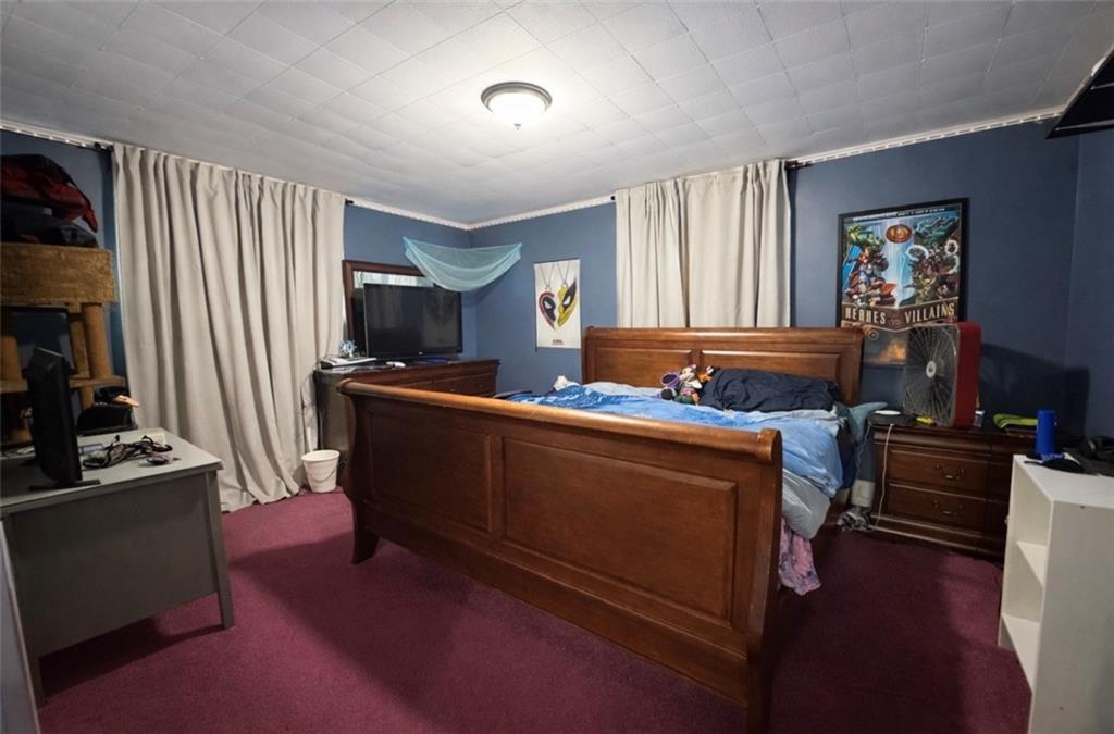 329 New Castle Street Slippery Rock, PA 16057 - Photo 9 of 27 a living room with furniture and a flat screen tv