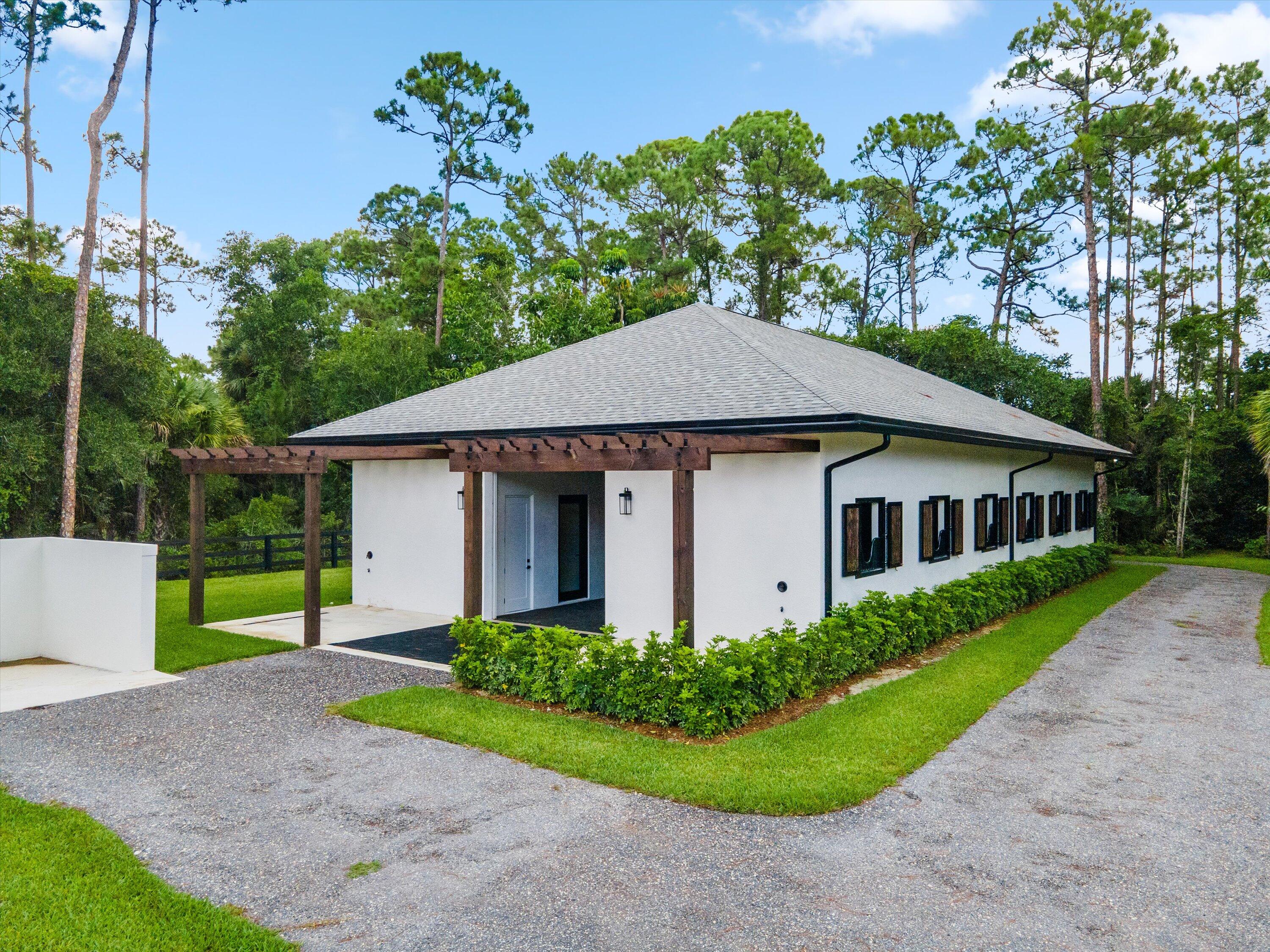 14479 Halter Road Wellington, FL 33414 - Photo 9 of 77 46-DJI_0582