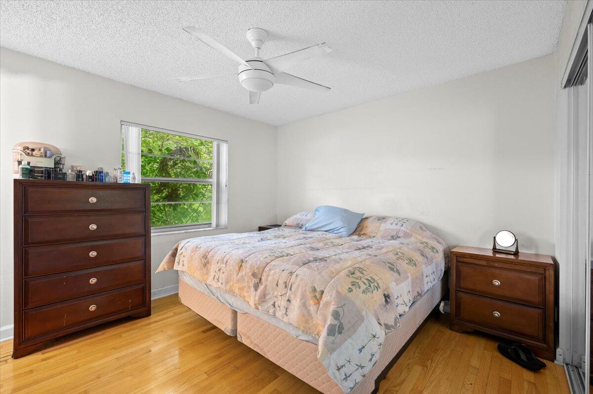 19309 Carolina Circle Boca Raton, FL 33434 - Photo 16 of 30 a bedroom with a bed and a window