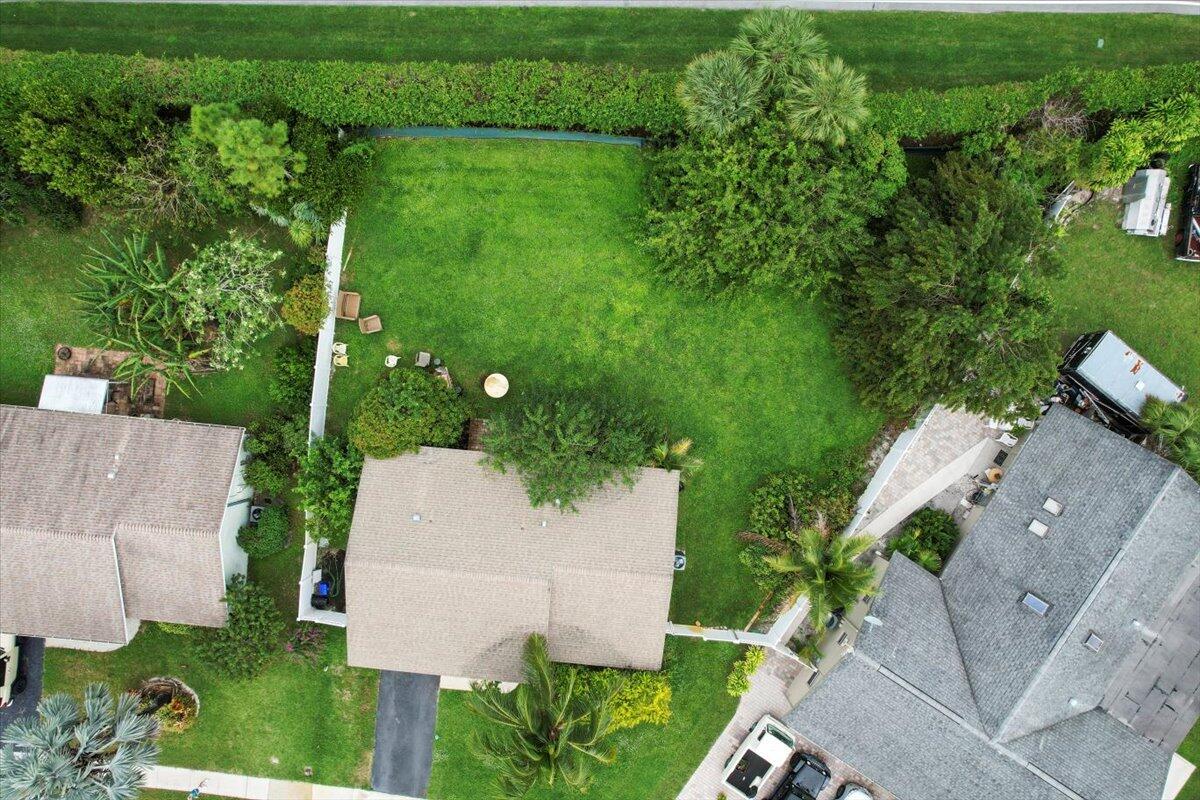 19309 Carolina Circle Boca Raton, FL 33434 - Photo 30 of 30 an aerial view of a house with a yard and lake view