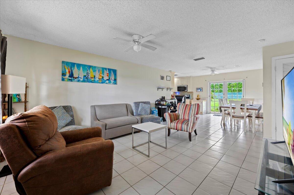 19309 Carolina Circle Boca Raton, FL 33434 - Photo 6 of 30 a living room with furniture and a large window