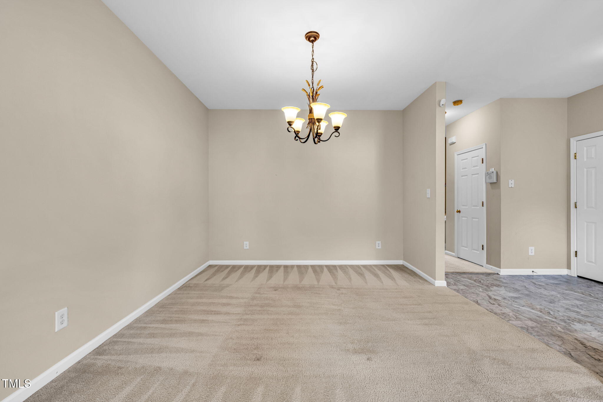 2737 Andover Glen Road Raleigh, NC 27604 - Photo 14 of 36 a view of a chandelier in big room and chandelier