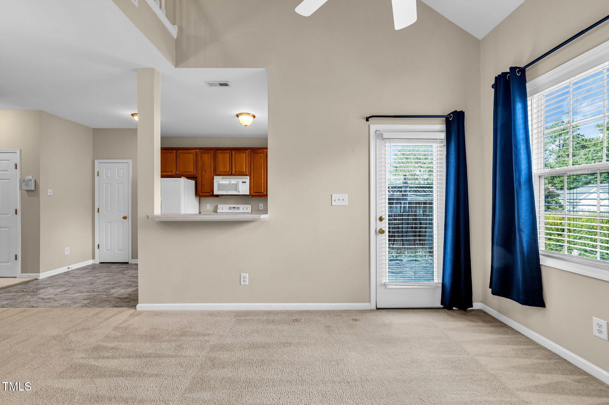 2737 Andover Glen Road Raleigh, NC 27604 - Photo 17 of 36 an empty room with window and cabinet