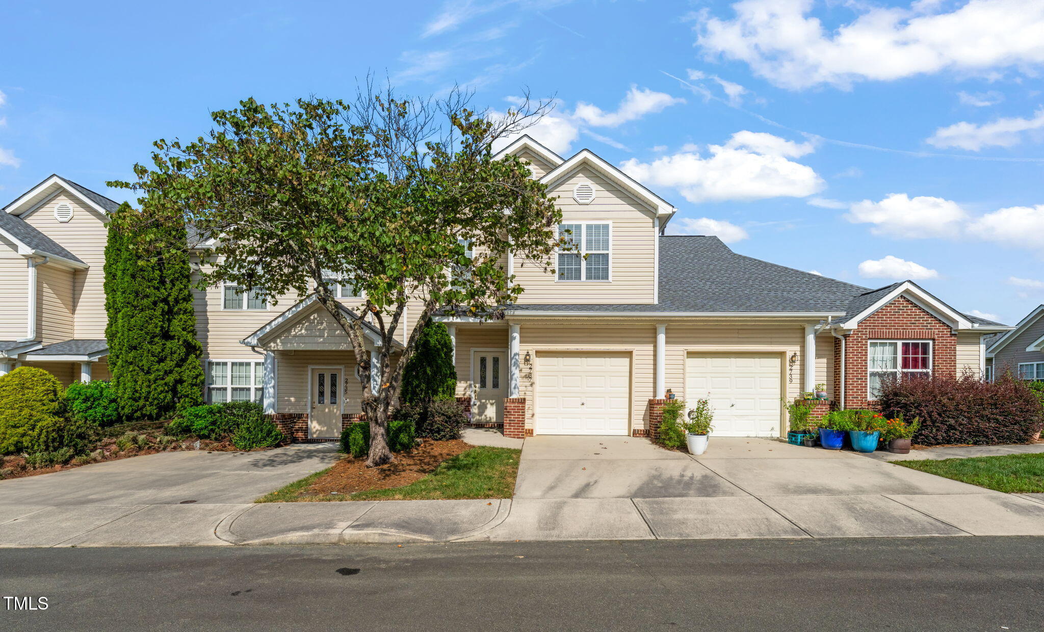 2737 Andover Glen Road Raleigh, NC 27604 - Photo 2 of 36 a front view of a house with garden