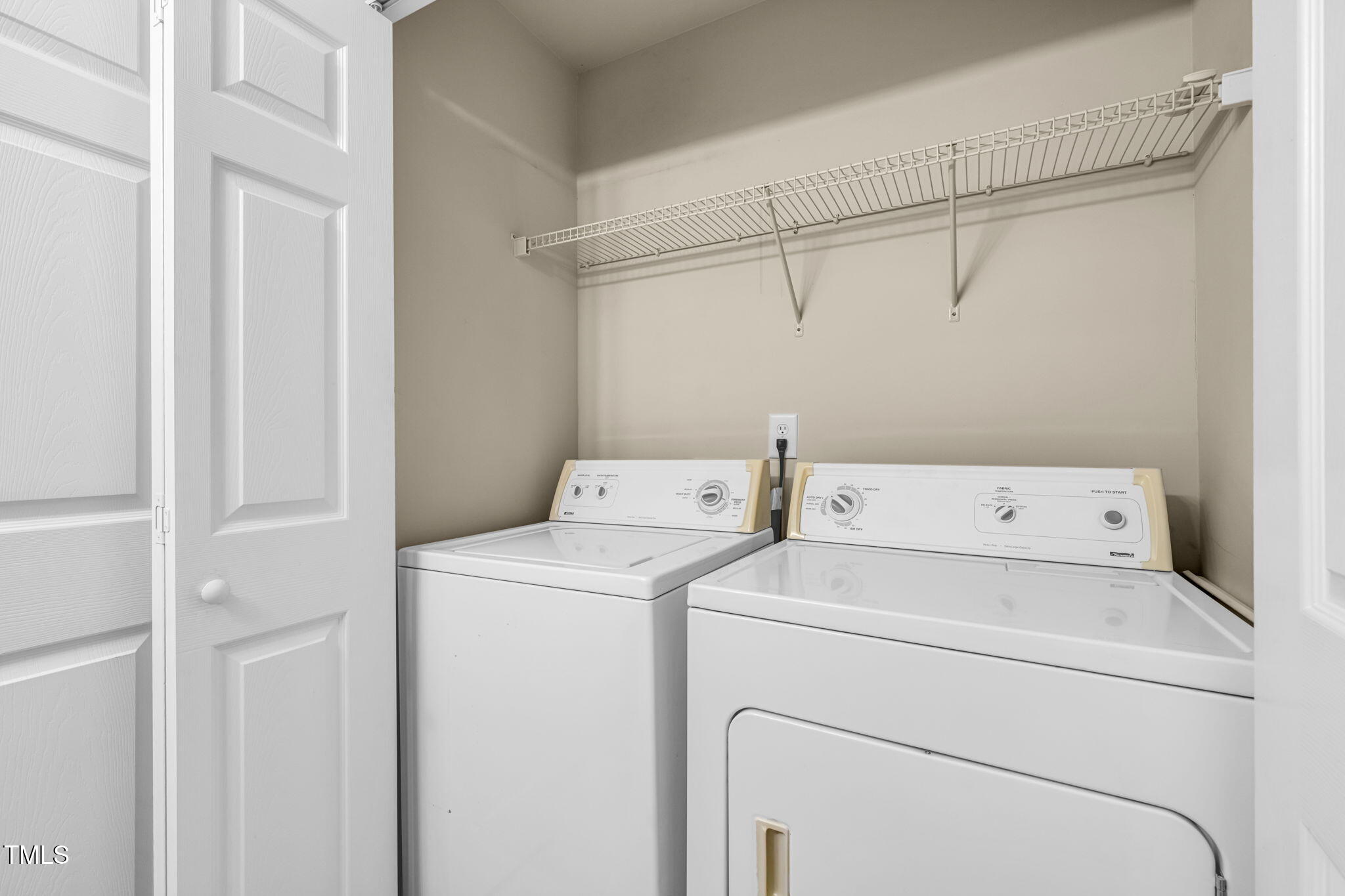 2737 Andover Glen Road Raleigh, NC 27604 - Photo 31 of 36 a utility room with dryer and washer