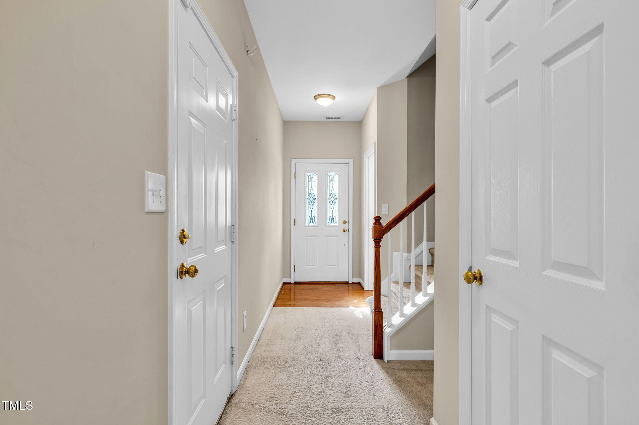 2737 Andover Glen Road Raleigh, NC 27604 - Photo 4 of 36 a view of an entryway with wooden floor