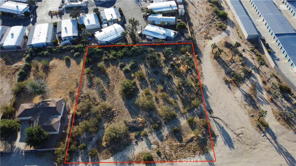 771 Scarvan Road Yucca Valley, CA 92284 - Photo 2 of 8 an aerial view of residential houses with outdoor space