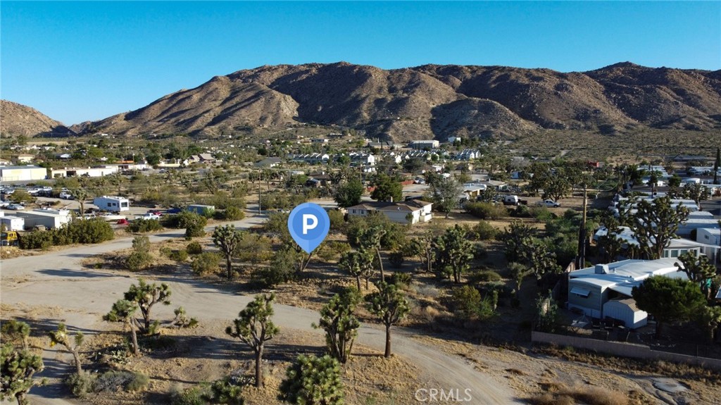 771 Scarvan Road Yucca Valley, CA 92284 - Photo 4 of 8 a view of city and mountain