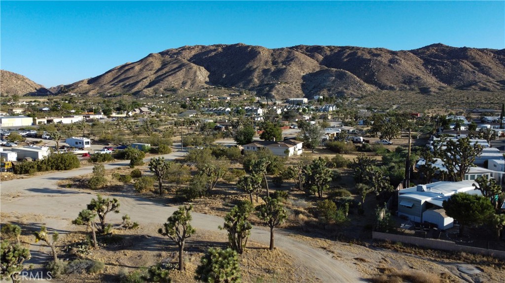 771 Scarvan Road Yucca Valley, CA 92284 - Photo 5 of 8 a view of a large building