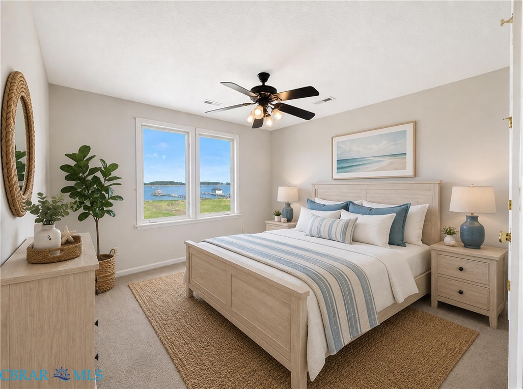 1214 Dandy Loop Road Yorktown, VA 23692 - Photo 54 of 65 a bedroom with a bed and a window