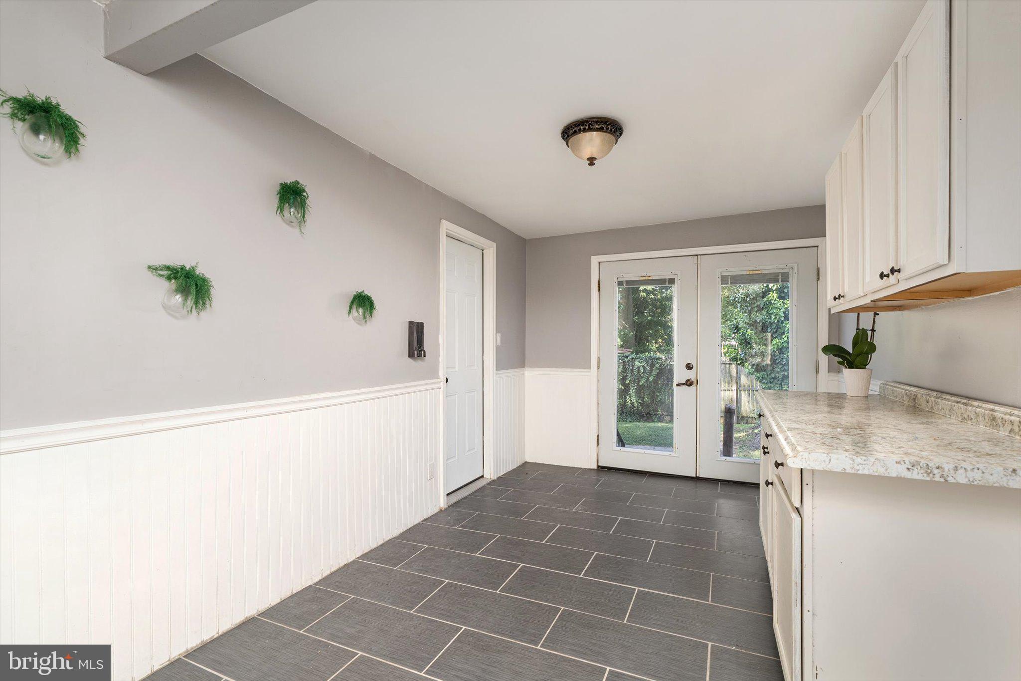 310 Pingree Avenue Ewing, NJ 08618 - Photo 12 of 28 a kitchen with a sink a stove and window