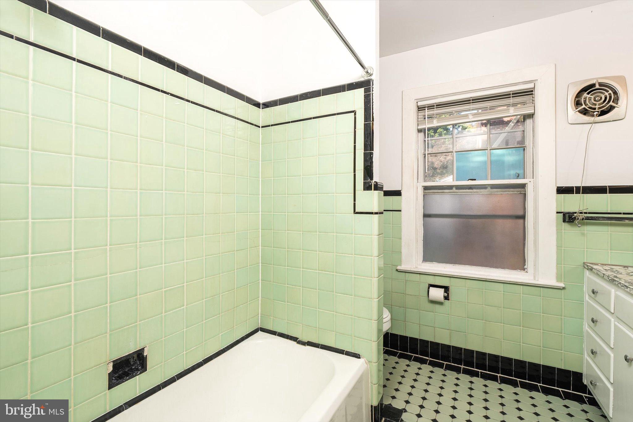 310 Pingree Avenue Ewing, NJ 08618 - Photo 14 of 28 a bathroom with a shower and a sink