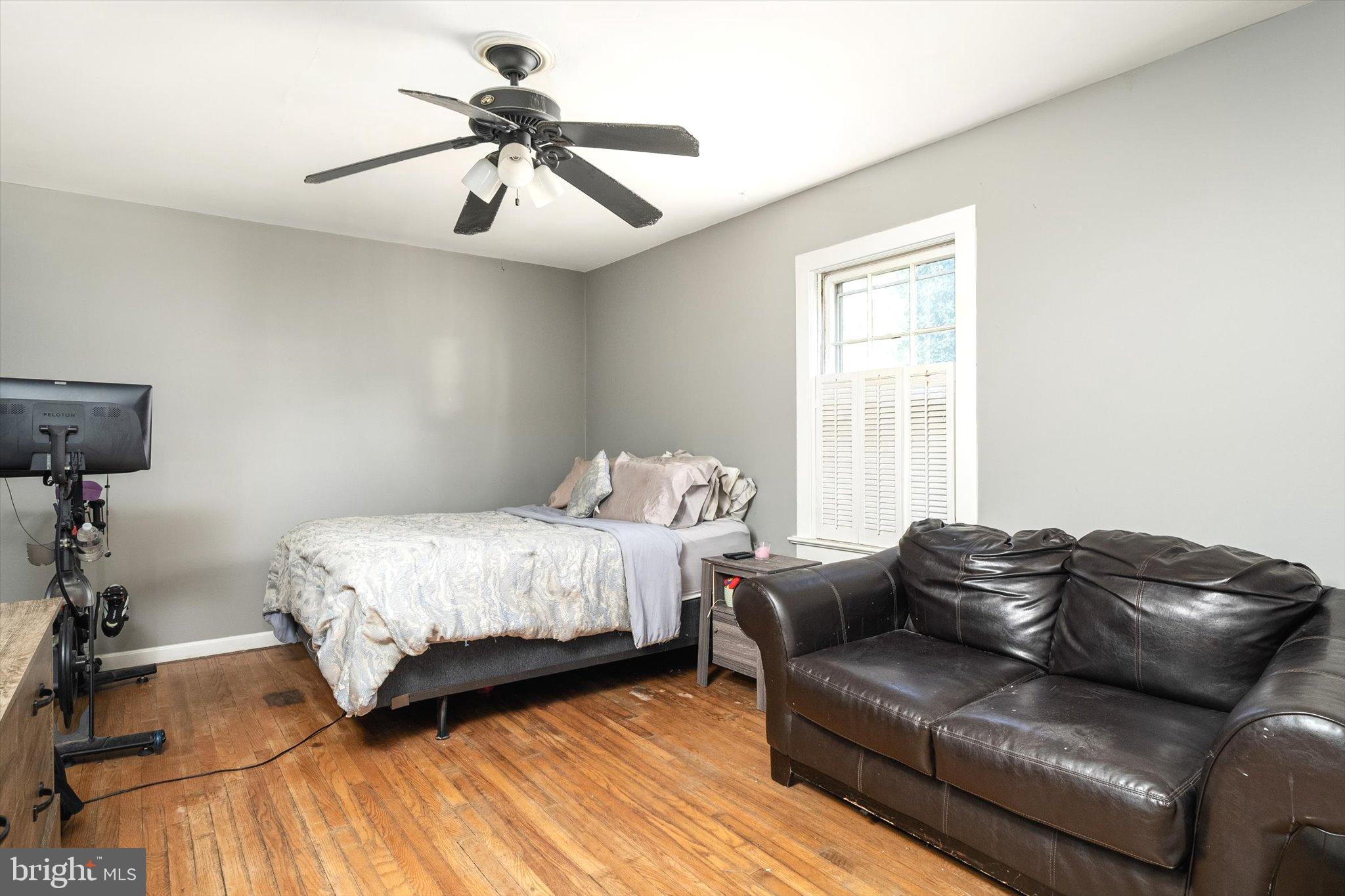 310 Pingree Avenue Ewing, NJ 08618 - Photo 17 of 28 a bed room with a bed and a couch