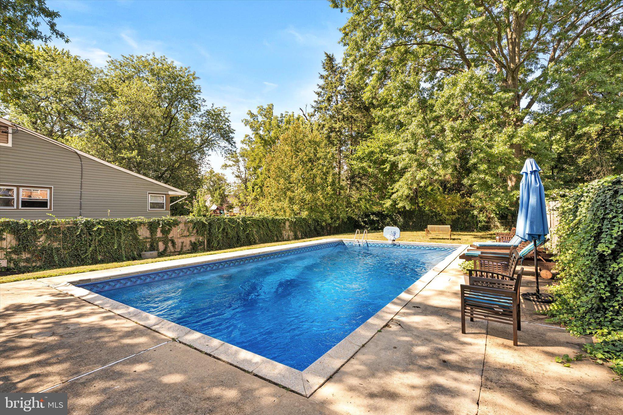 310 Pingree Avenue Ewing, NJ 08618 - Photo 27 of 28 a view of yard with swimming pool and seating space