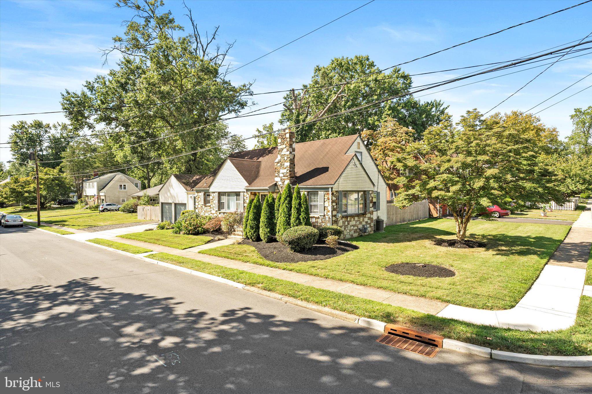 310 Pingree Avenue Ewing, NJ 08618 - Photo 3 of 28 a view of a house with basketball court