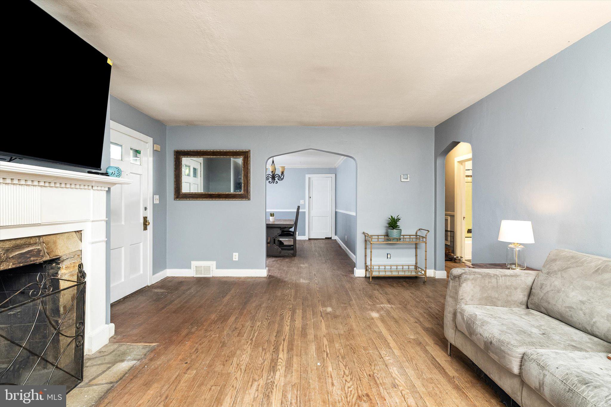 310 Pingree Avenue Ewing, NJ 08618 - Photo 8 of 28 a living room with furniture fireplace and flat screen tv