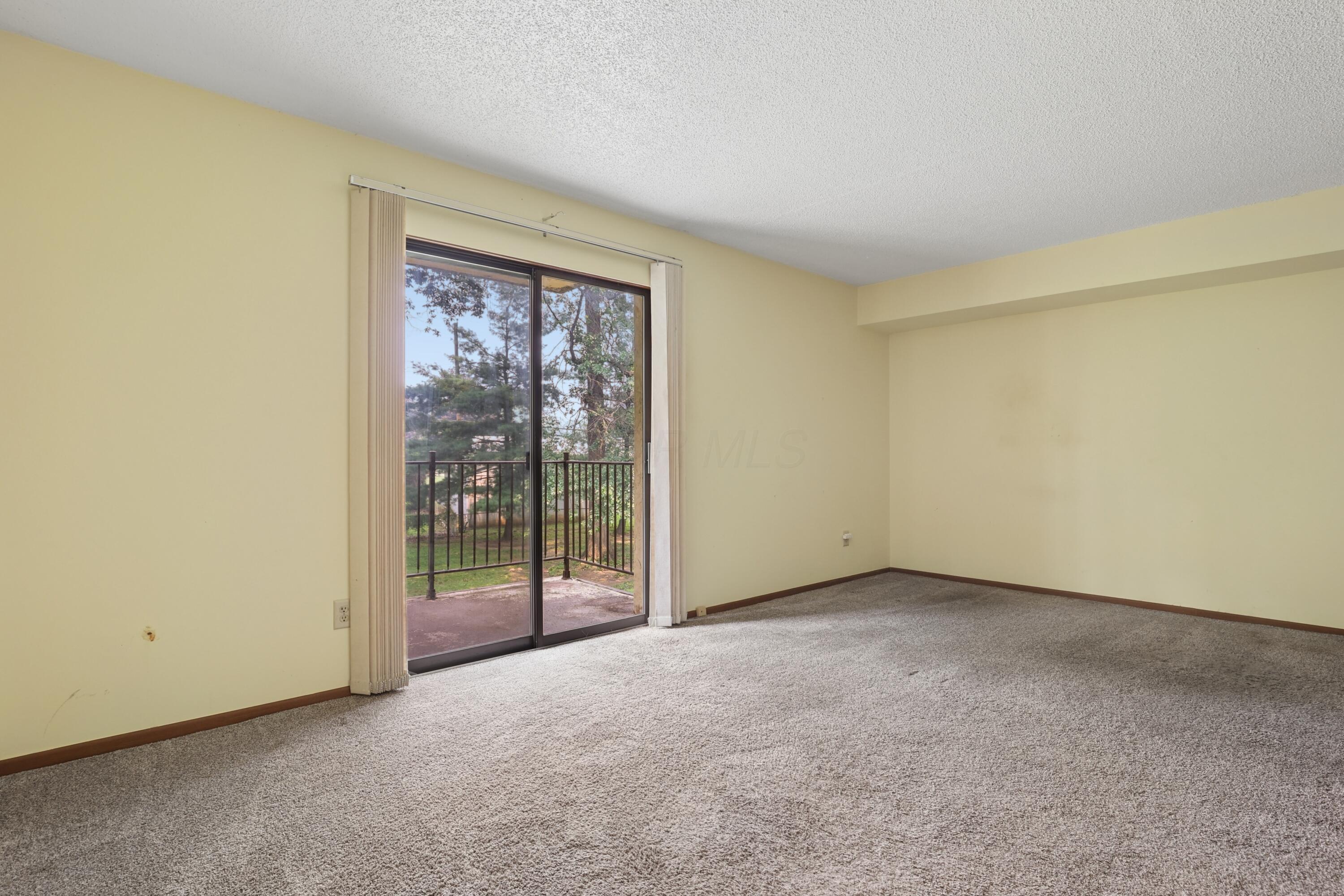 4145 Karl Road, Unit 228 Columbus, OH 43224 - Photo 18 of 29 Bedroom 2 with Balcony 2