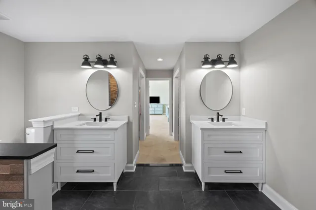 a living room with a fireplace furniture and a flat screen tv
