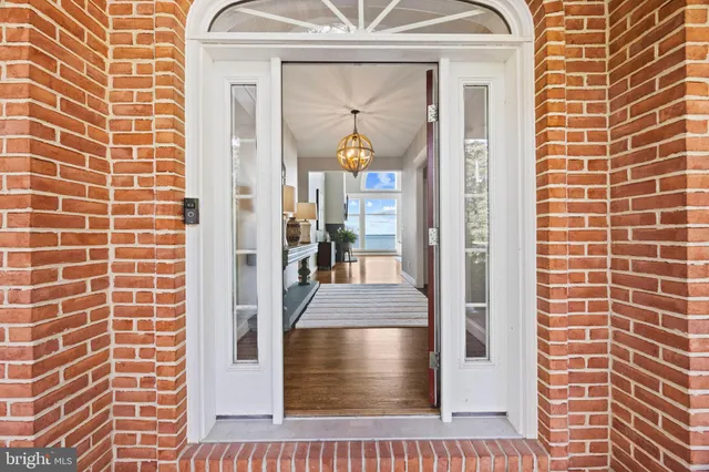 a living room with fireplace furniture and a flat screen tv