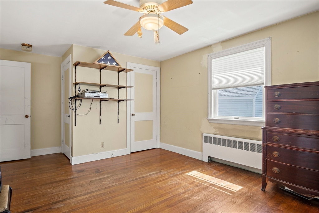 4 Merrow Lane Stoneham, MA 02180 - Photo 19 of 33 a view of a livingroom with a staircase