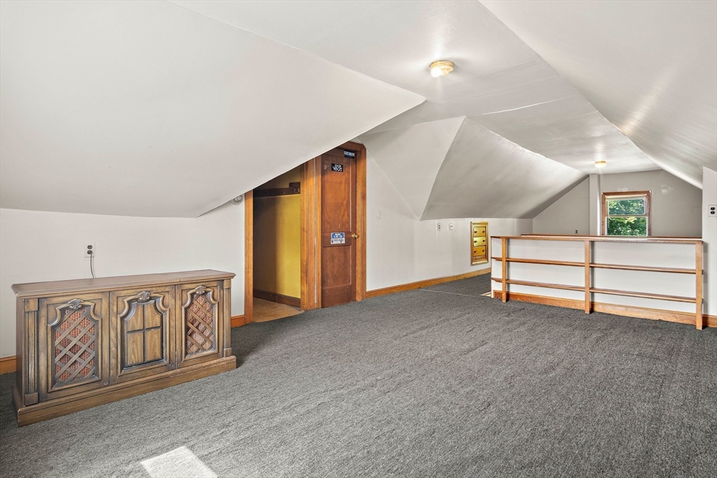 4 Merrow Lane Stoneham, MA 02180 - Photo 24 of 33 a view of an empty room with stairs