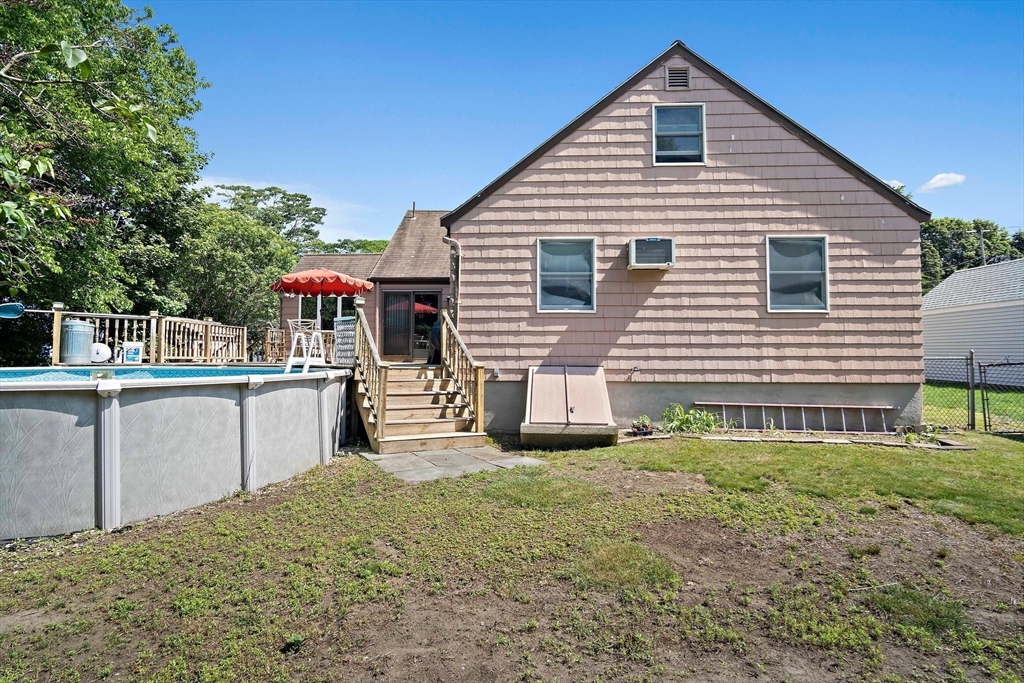 4 Merrow Lane Stoneham, MA 02180 - Photo 29 of 33 a house view with a outdoor seating