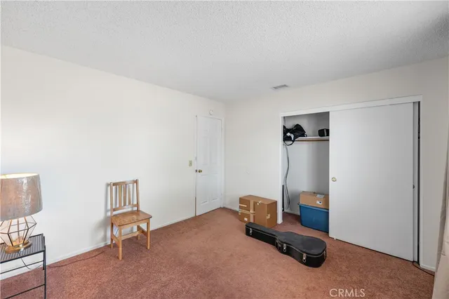 a room with furniture and air hockey table