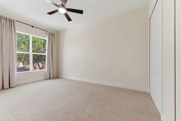 an aerial view of a house with a lot of trees