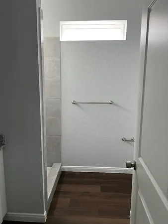 a view of small space with wooden floor