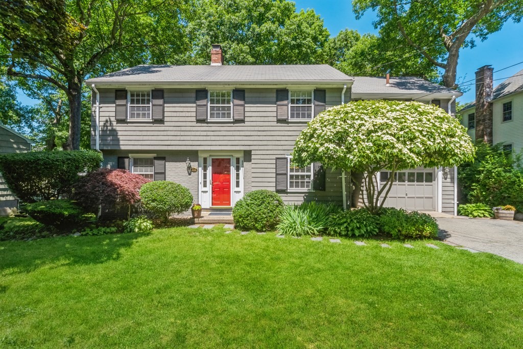 110 Parker Road Needham, MA 02494 - Photo 1 of 33 a front view of a house with a yard and potted plants