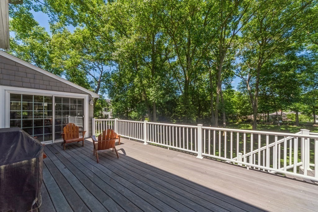 110 Parker Road Needham, MA 02494 - Photo 31 of 33 a view of a deck with wooden floor and seating space