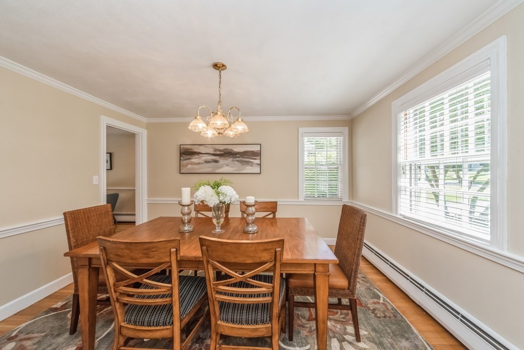 110 Parker Road Needham, MA 02494 - Photo 6 of 33 a view of a dining room with furniture window and outside view