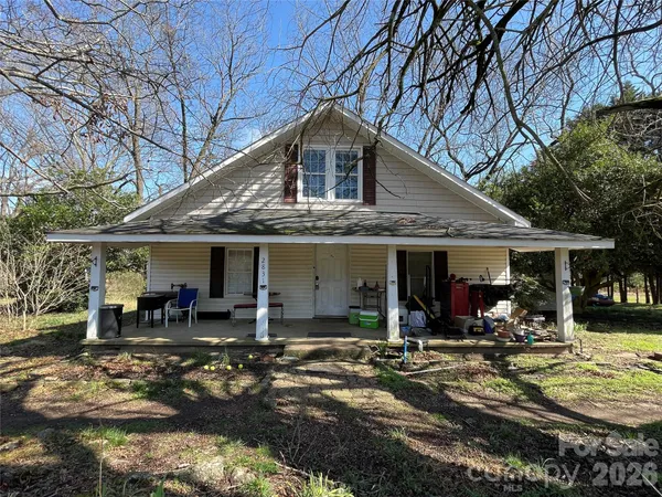 a front view of a house with patio