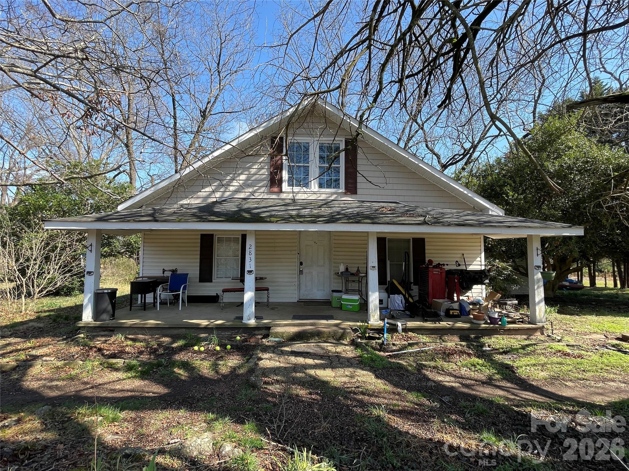 2831 Bettis Road Grover, NC 28073 - Photo 1 of 34 a front view of a house with patio