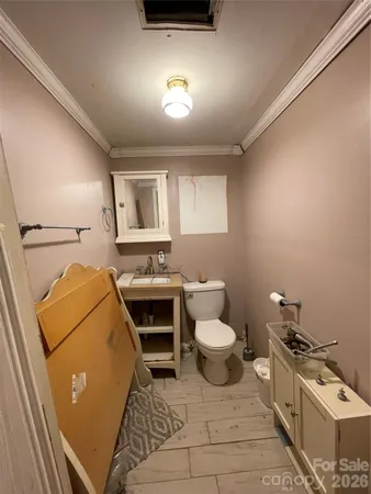 a bathroom with a sink and a toilet