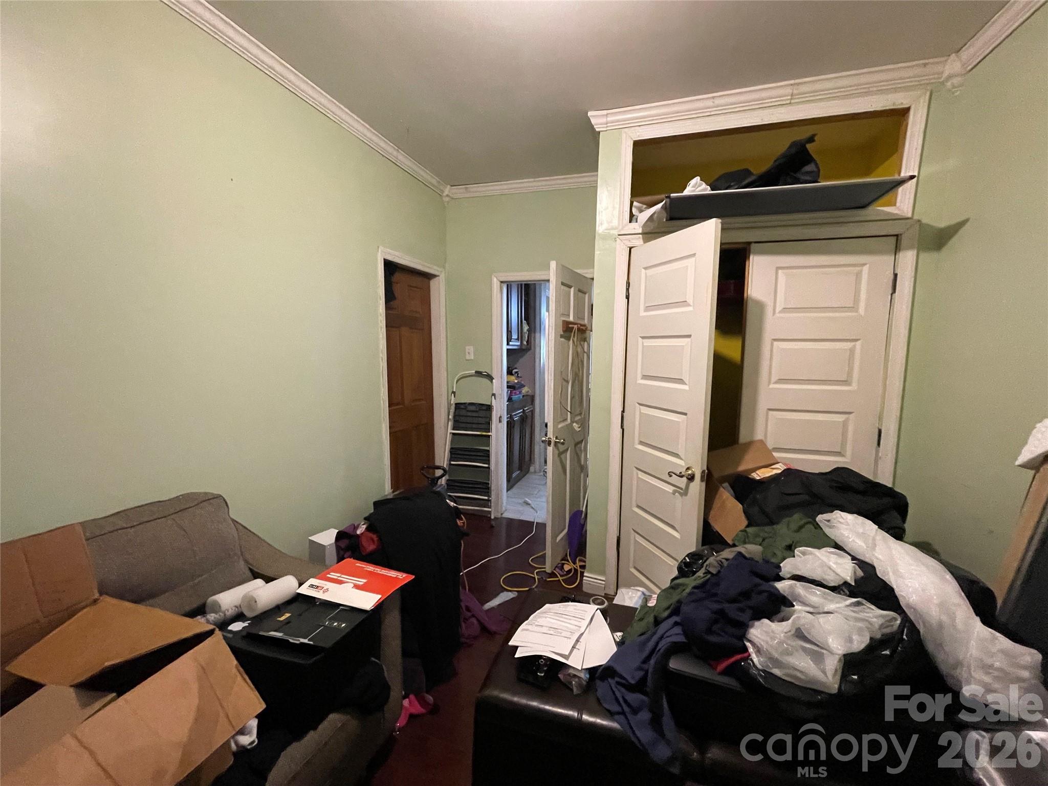 2831 Bettis Road Grover, NC 28073 - Photo 21 of 34 a bedroom with a bed and a couch