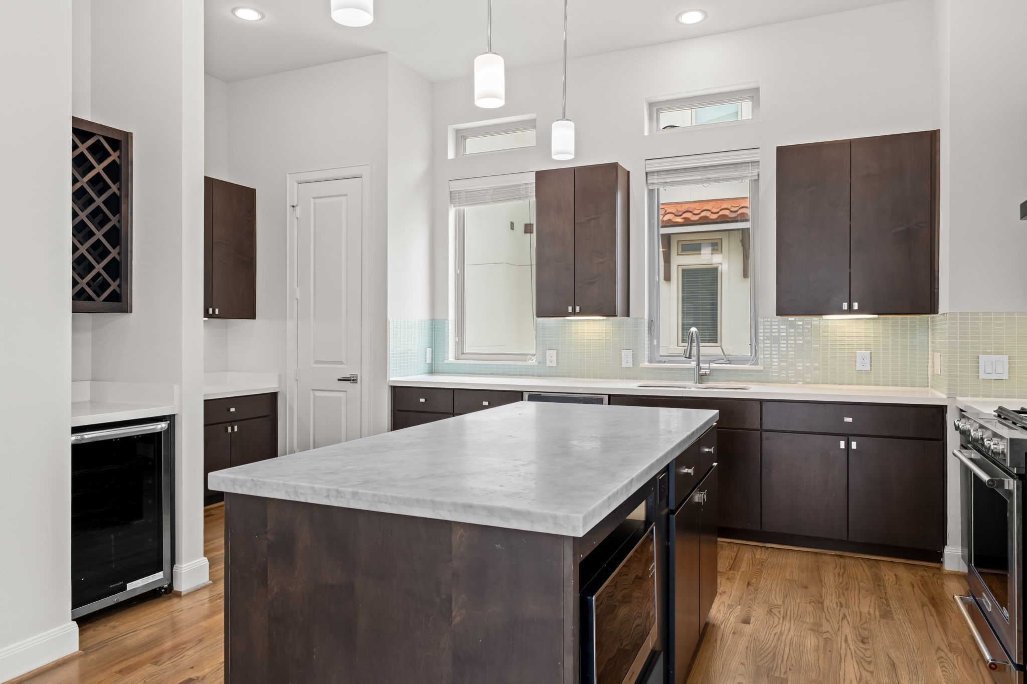 4115 Schuler Street Houston, TX 77007 - Photo 14 of 32 Spacious kitchen with large island, sleek cabinetry, and ample prep space perfect for everyday living and entertaining.