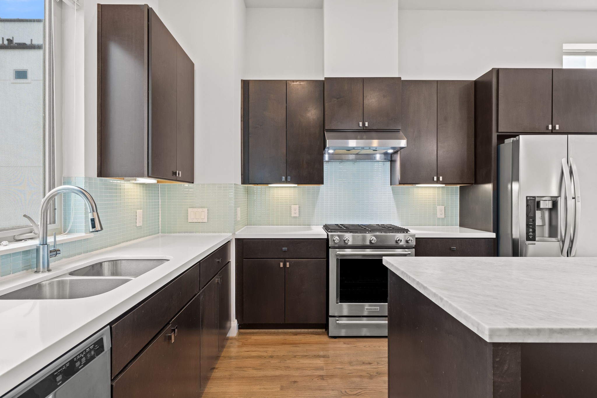 4115 Schuler Street Houston, TX 77007 - Photo 15 of 32 Well equipped kitchen featuring stainless steel appliances, amble cabinetry and a functional layout designed for everyday ease.