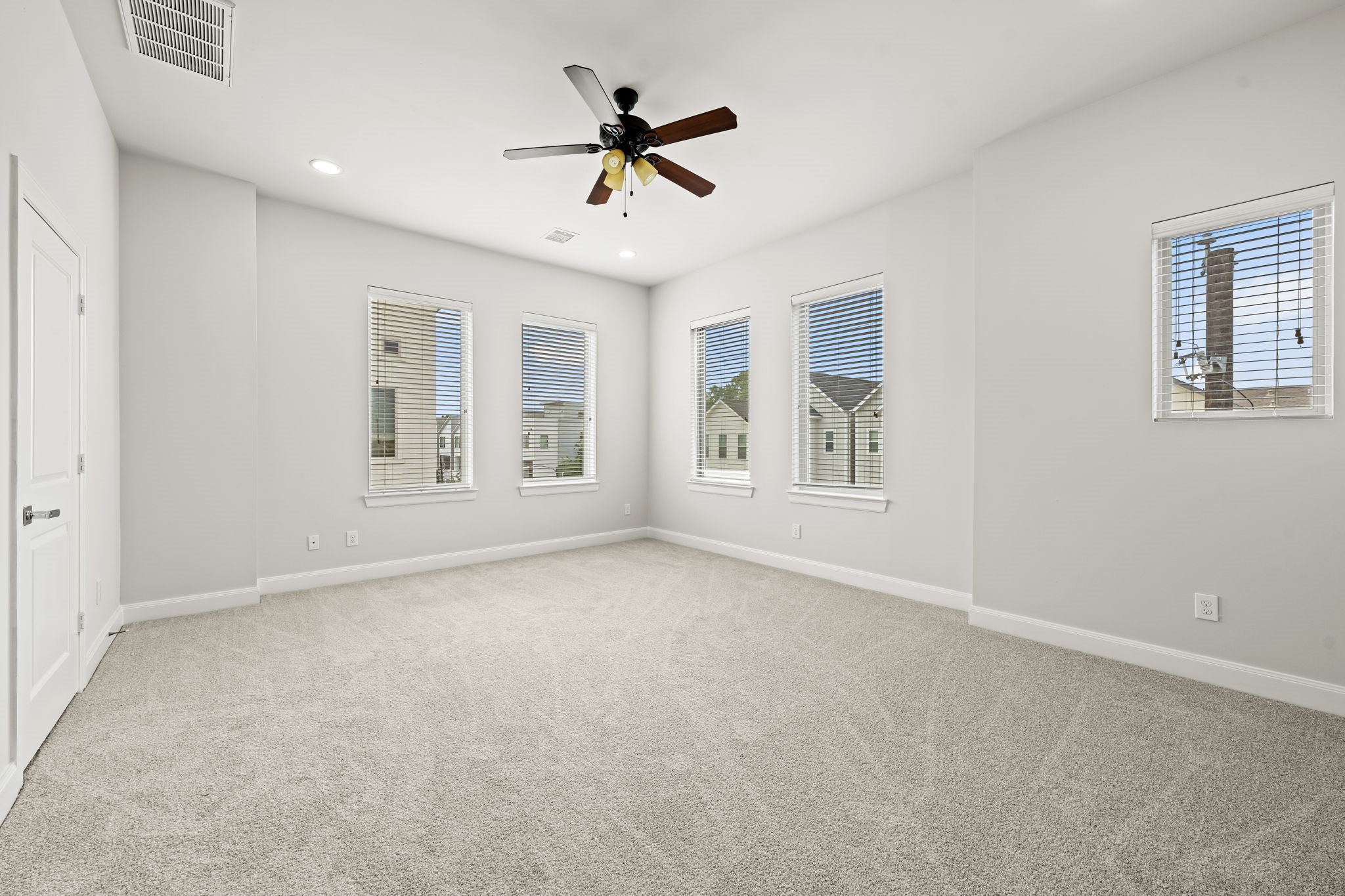 4115 Schuler Street Houston, TX 77007 - Photo 22 of 32 Spacious primary bedroom with abundant soft natural light and a calm airy feel.