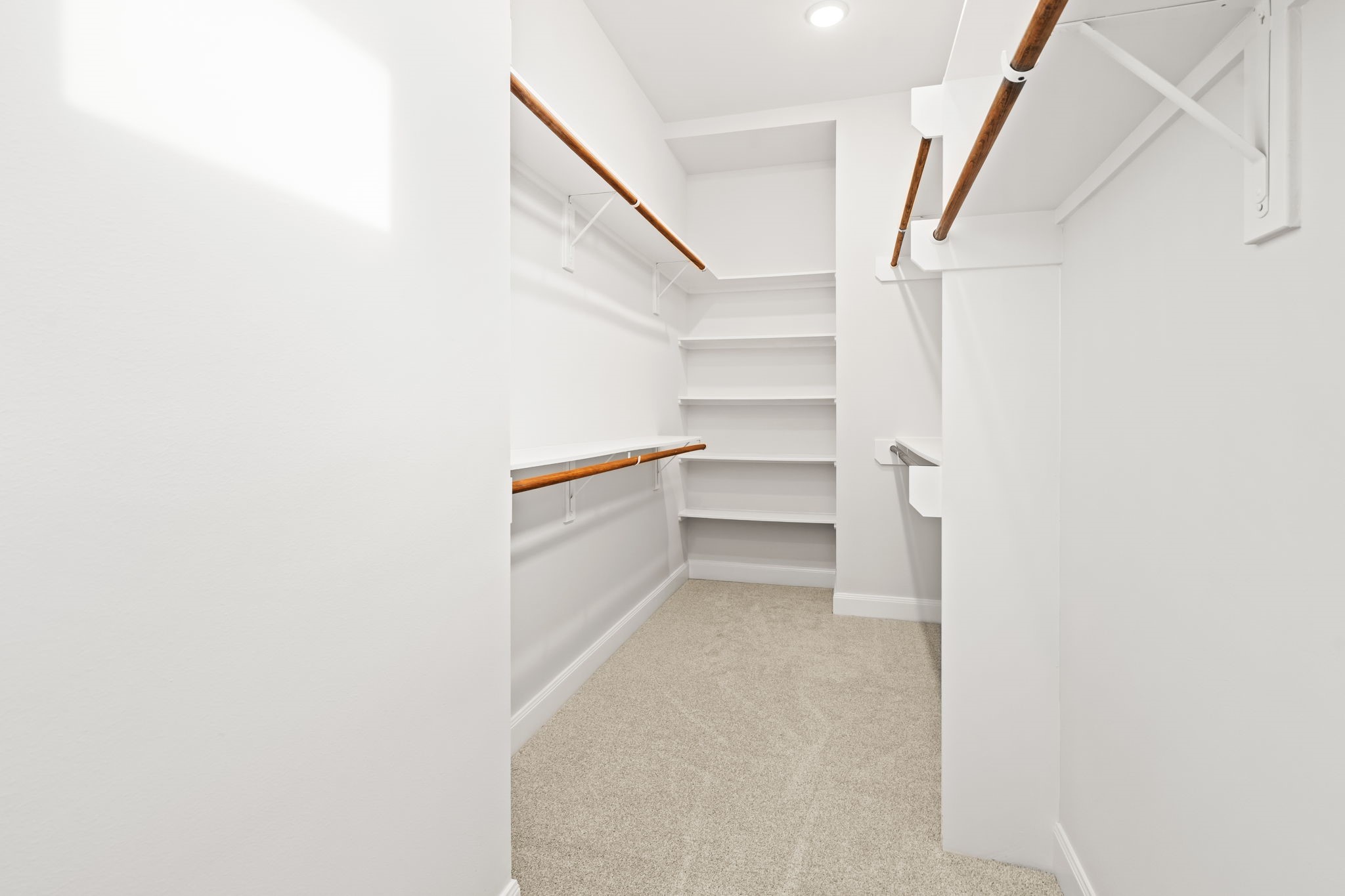 4115 Schuler Street Houston, TX 77007 - Photo 25 of 32 Generous walk in closet with built in shelving and ample handing space for easy organization.