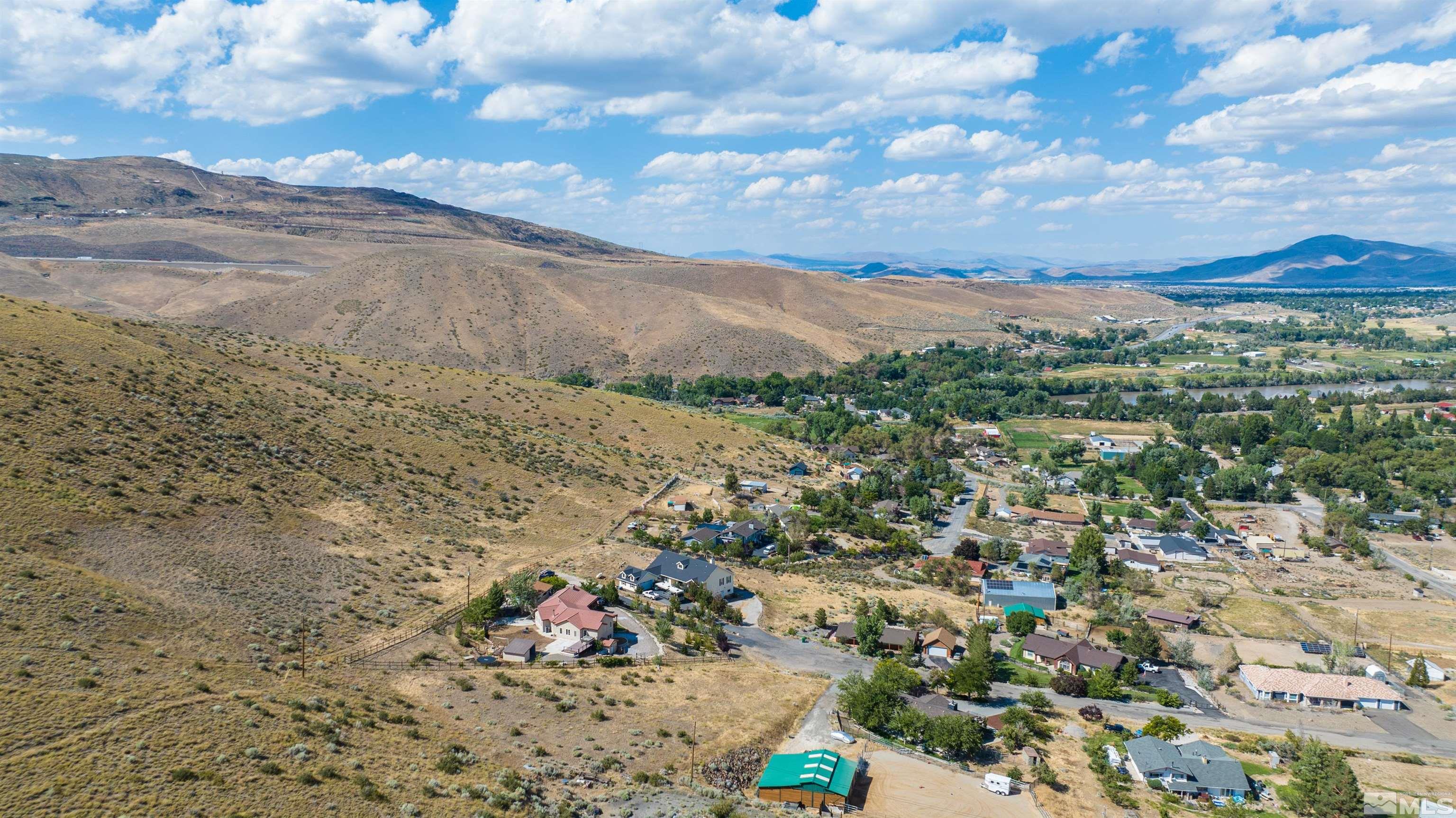 110 Del Mesa Circle Reno, NV 89521 - Photo 21 of 33 a view of a city with mountains in the background